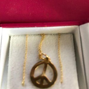 Helen Ficalora gold peace necklace